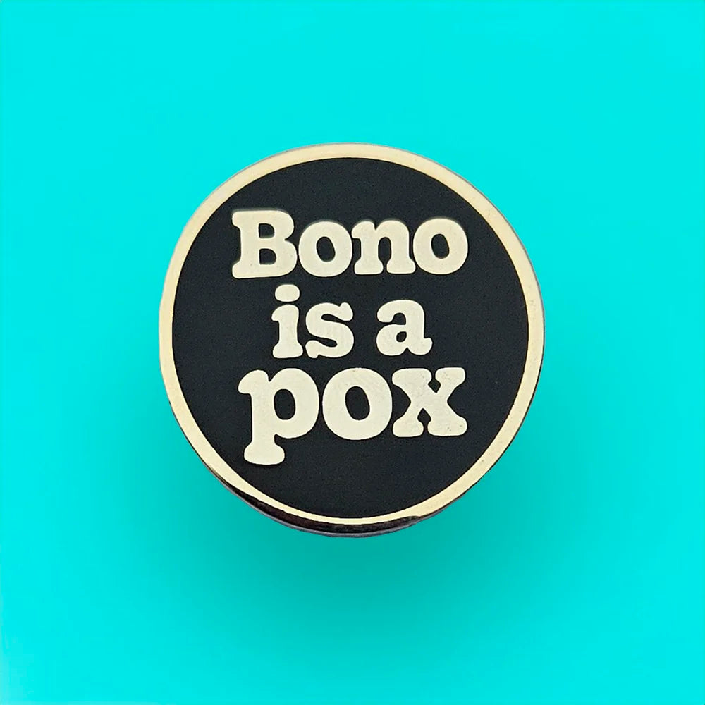 Bono is a Pox Enamel Pin