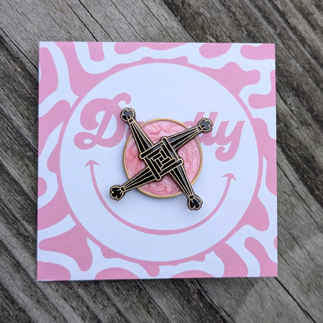 St Brigid's Cross spinning enamel badge, in pink, modern Irish culture gifts by Deadly.ie.