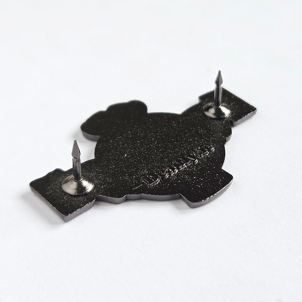 The back of the Pint Claddagh pin, showing two pin backs