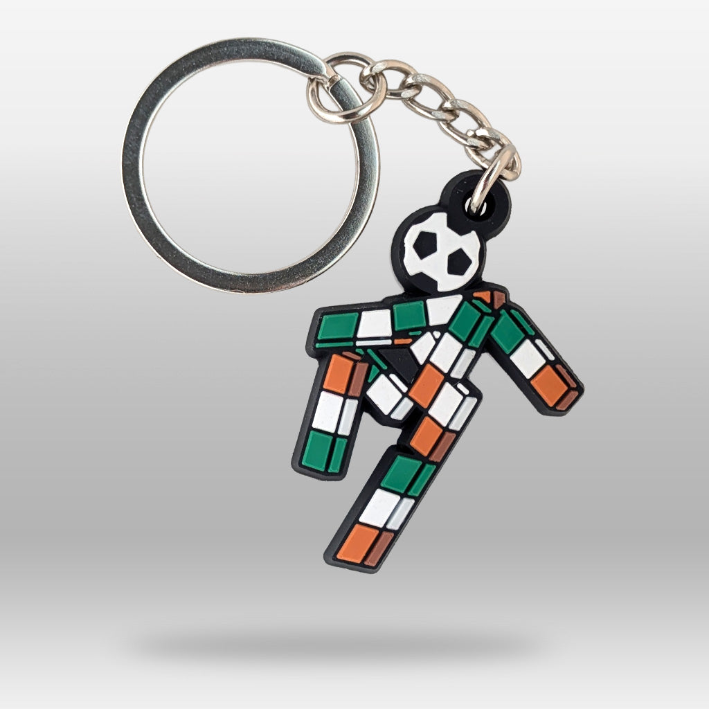 A keyring of a footballer made by various boxes in the irish colours of green, white and orange. 
