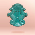 A green pin showing the Hippocampus statues from grattan bridge against a peach-coloured background