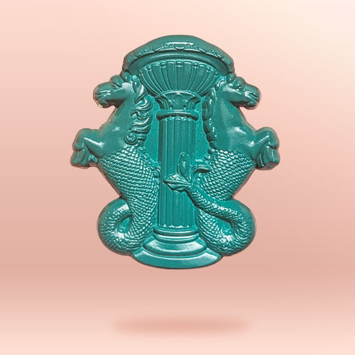 A green pin showing the Hippocampus statues from grattan bridge against a peach-coloured background