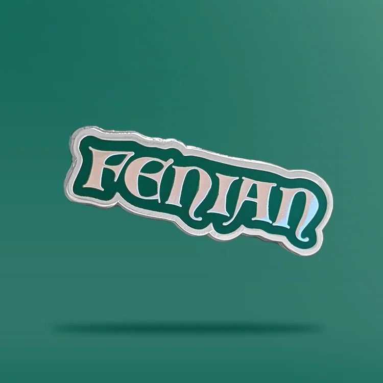 A green pin that reads 'Fenian'
