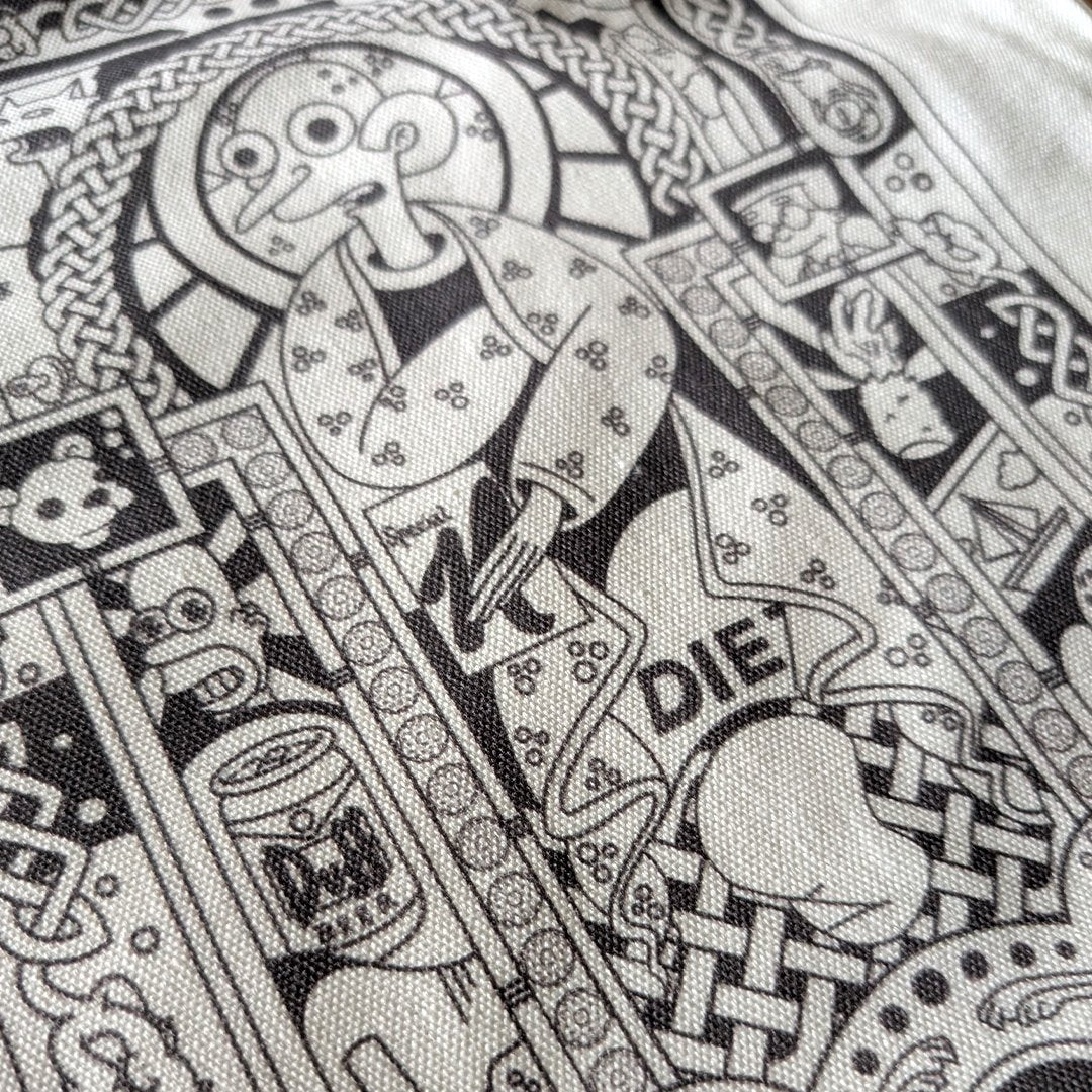 Black and white intricate book of kells design with various elements and text on a textured background